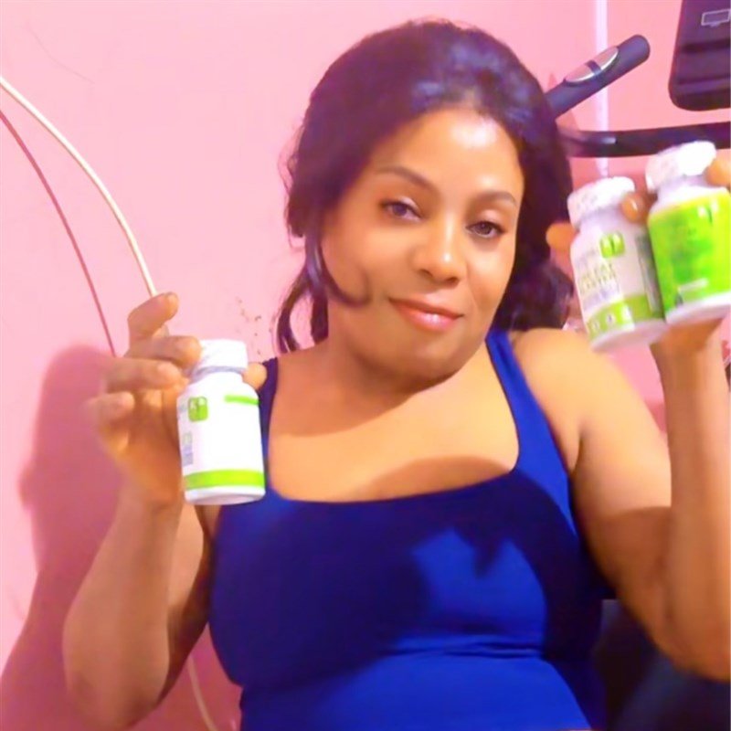 Felecia Pupoh today, holding Slimming Beauty products