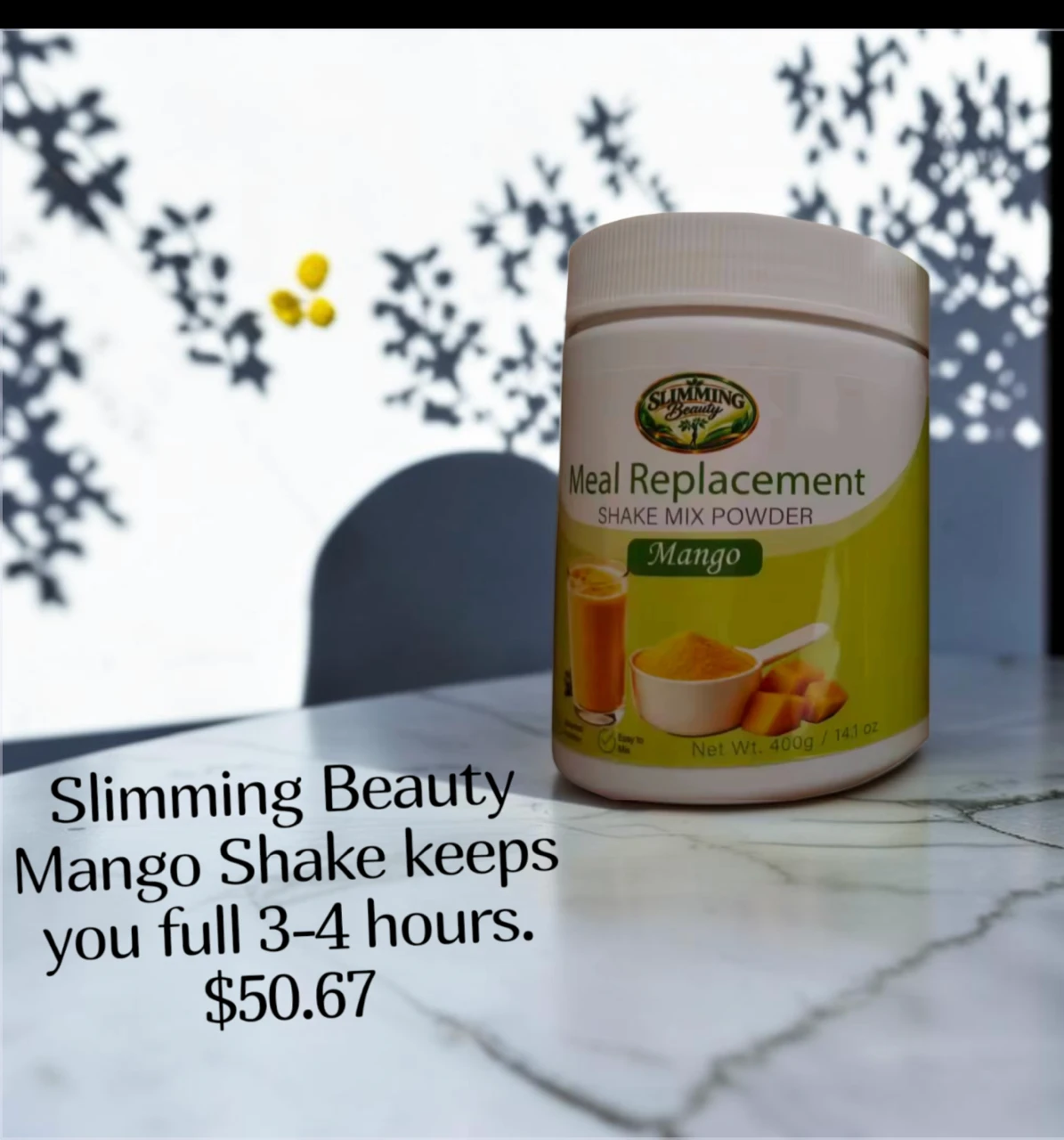 Slimming Beauty Mango Meal Replacement Shake Mix Powder, 400 g (14.1 oz), on a marble table